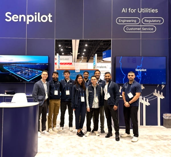 The Senpilot team together at its AI for Utilities conference booth